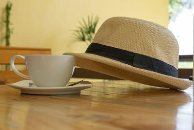 Close-up of coffee cup on table