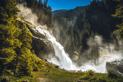 Scenic view of waterfall in forest