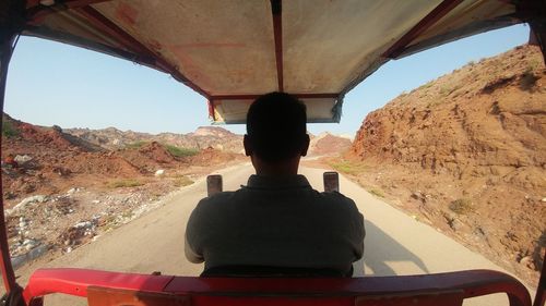 Rear view of man looking at view