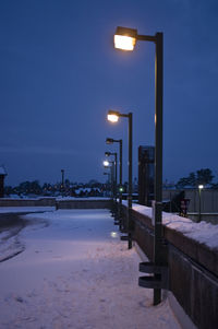 Illuminated street light at night