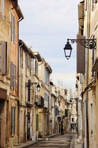 Woman walking in alley