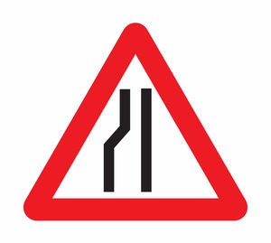 Close-up of road sign against white background