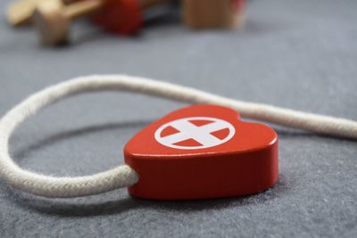 Close-up of telephone booth on table