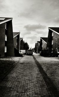 Road in city against sky