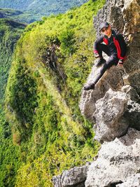 Full length of man on rock