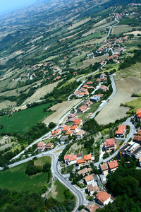 High angle view of road amidst buildings in city