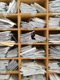 Full frame shot of documents on shelves