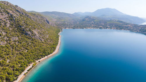 High angle view of swimming pool by sea against sky