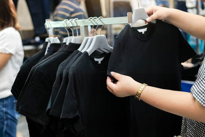 A t-shirt wear comfortable clothes hanger on no in the department store.