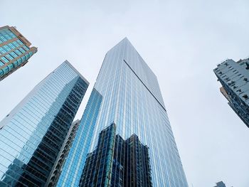 Low angle view of modern buildings against sky