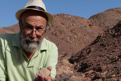 Senior archaeologist in the desert 