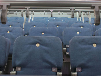 Low angle view of seats at stadium
