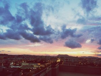 Cityscape against sky during sunset