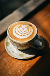 Close-up of cappuccino on table