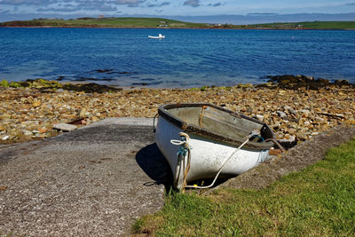 Boat moored on shore