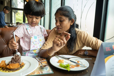 Mother and daughter at home