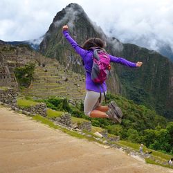 Full length of man standing on mountain