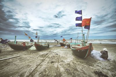 Scenic view of sea against cloudy sky