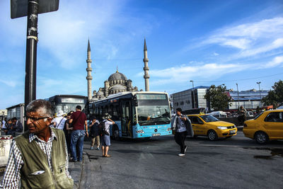 Group of people on street in city