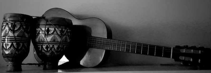 Close-up of guitar on table at home