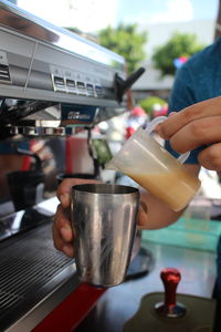 Close-up of man drinking glass