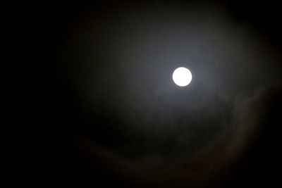 Low angle view of moon against sky at night