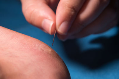 Close-up of woman holding hands