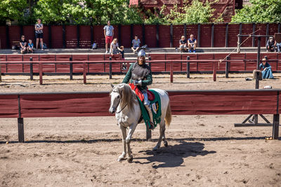 Man riding horse cart