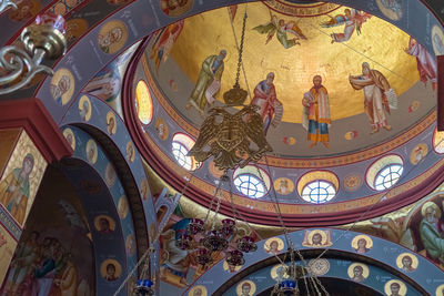 Low angle view of ornate ceiling in building