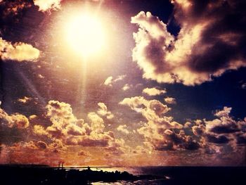 Scenic view of sea against sky at sunset