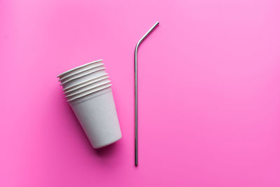 High angle view of pink paper on table