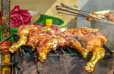 Close-up of meat on barbecue grill