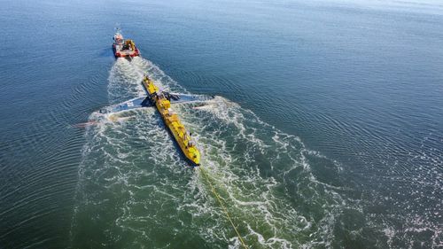 High angle view of people in sea