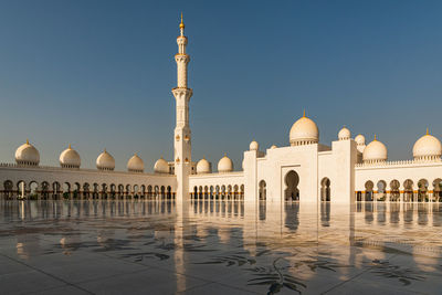 Low angle view of mosque against clear sky