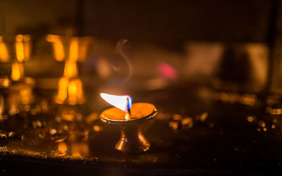 Close-up of illuminated candle