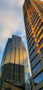 Low angle view of modern buildings against sky