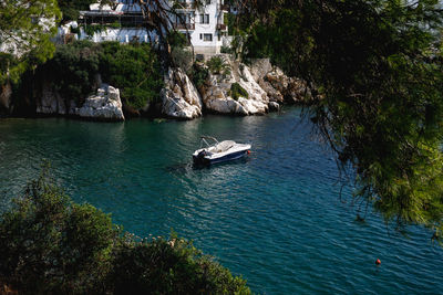 High angle view of sailboats in sea