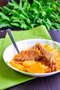 Close-up of fish curry in plate