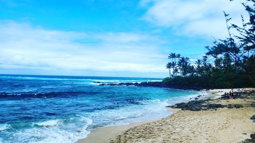 Scenic view of beach against sky