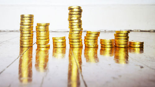 Close-up of coins on table