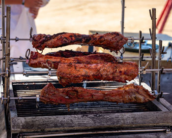 Close-up of boar meat on barbecue grill