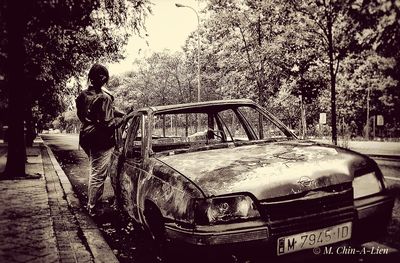 Man sitting in car