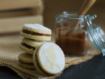 Close-up of dessert in jar on table