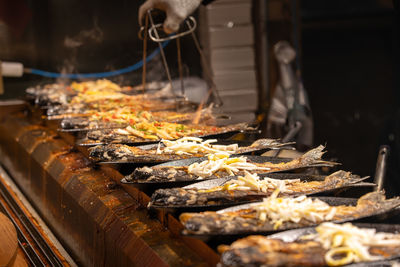 Close-up of meat on barbecue grill
