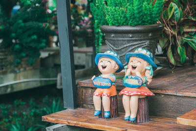 Close-up of dolls on table