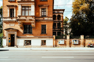 Exterior of old building by road