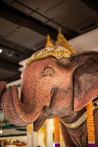 Close-up of statue against building