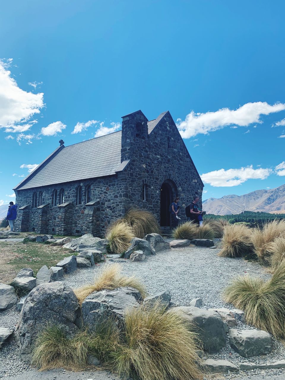 built structure, architecture, sky, building exterior, building, cloud - sky, nature, house, plant, no people, day, land, water, grass, blue, rock, solid, religion, rock - object