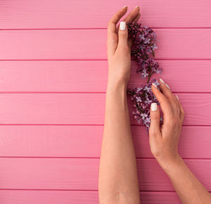 Cropped hand of woman holding hands