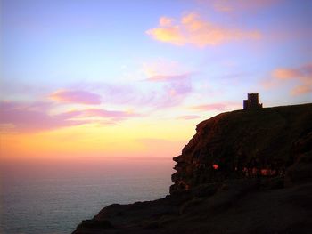 Scenic view of sea at sunset